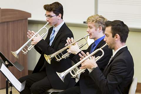 Stamps Brass Quintet class of 2020 playing trumpets